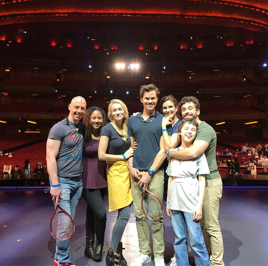 Photograph of the cast of 'Falsettos' on stage.