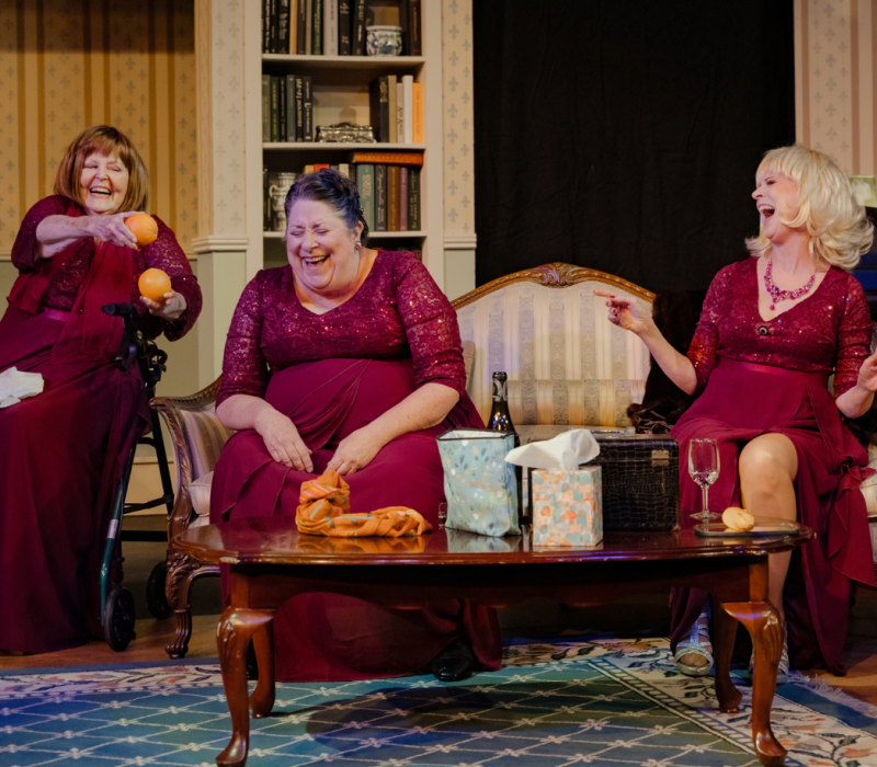 three actresses and friends in The Cemetery Club laugh